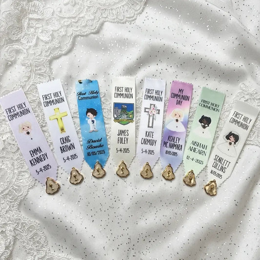 A selection of custom communion badges in different colours and graphic designs from Dats Lovely.